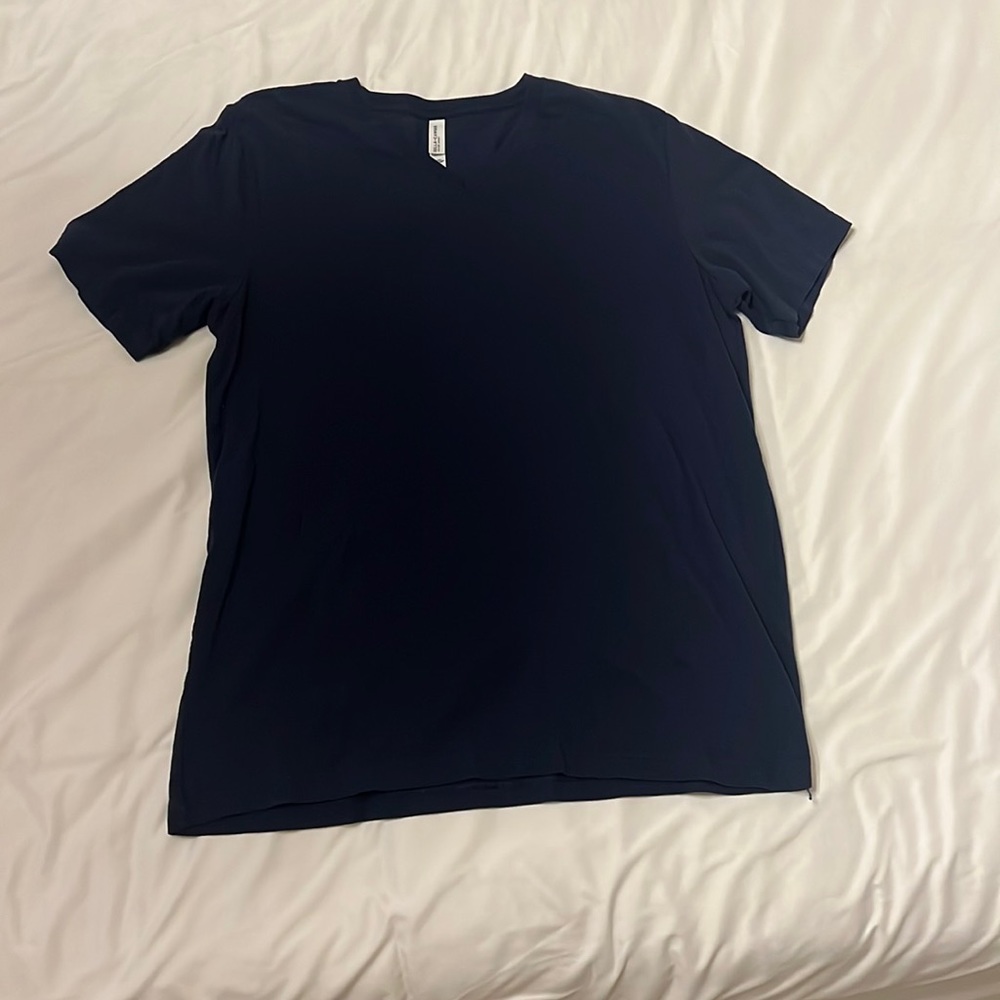 3 different shirts from Bella + canvas. Navy blue, gray/blue, and turquoise XL